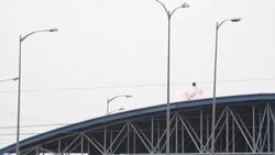 CLEAN : Inmates hold signs from roof of Ecuador jail where 118 died in riots News Clip
