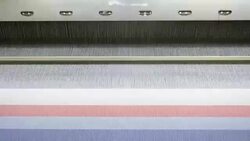 Colorful Threads on a loom in  weaving loom machine in textile factory Stock Footage