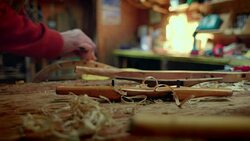 A piece of wood is rounded using workshop tools. Stock Footage
