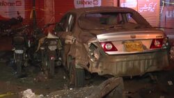 CLEAN : Damaged vehicles and security after a deadly bombing in Pakistan's Karachi News Clip