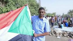 People celebrate on the streets of Sudan after the president Omar al Bashir has stepped down News Clip