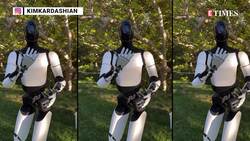 Kim Kardashian Teaches Tesla Robot 'Optimus' How To Blow A Kiss, Plays Rock-Paper-Scissors News Clip