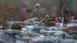 CLEAN : Refugees from Ukraine rest in a shelter after entering Poland News Clip