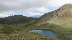 Time lapse lake scenes in mountains, national park Dombai, Caucasus, Russia, Europe Stock Footage