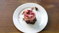 Eating brownie raspberries cake. Stock Footage