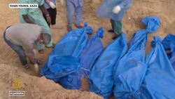 More than 100 Palestinians buried in mass grave in Gaza’s Khan Younis News Clip