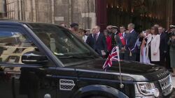 Theresa May and her husband Philip May departing from Cathedral of Bayeux News Clip