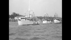 Father Herbert Mullin blesses shrimp fleet at Biloxi, MS News Clip