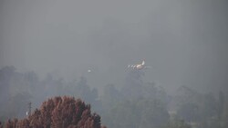 Calmer weather aids fire crews in California Instructional Video