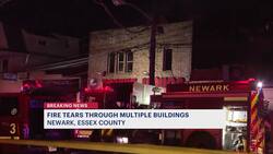 Officials: Newark fire tears through several buildings, displaces family News Clip