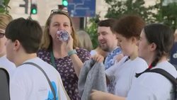 Children and their families with placards gather ahead of protest over funding crisis in education for young people with special educational needs and disabilities News Clip
