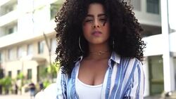 Young Girl Using Mobile Outdoors Stock Footage