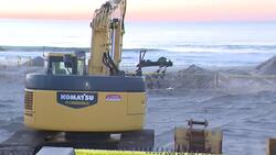 Officials work on beach replenishment at Sea Girt where toddler got trapped in sand News Clip