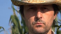 Portrait of pensive serious farmer in corn field Stock Footage