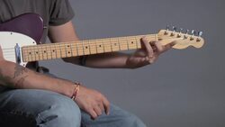 How to Play an E7 Barre Chord on Guitar Instructional Video