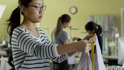 Female Tailor Discussing Design with Client Stock Footage