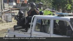 Plane hit by gunfire at Haiti airport News Clip