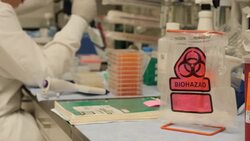 Scientists working in a Novavax coronavirus vaccine lab News Clip