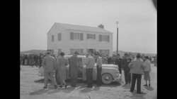 House, cars, dummies and US soldiers exposed to Atom Bomb test at Yucca Flat, NV News Clip