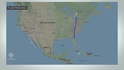 Man charged after claiming to have coronavirus, forcing plane back to Toronto News Clip