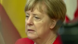 Angela Merkel seen being interviewed at EU Summit News Clip