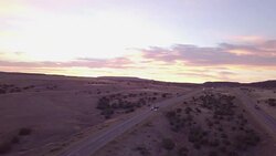 Aerial Drone Footage of Semi-Trucks Rolling Down the Highway Stock Footage