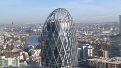 CLEAN : Paris: tightrope walker hovers 150 m above ground crossing the void between towers in the business district News Clip