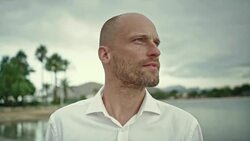 Businessman enjoying the beach Stock Footage