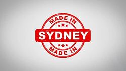 Made In SYDNEY Signed Stamping Text Wooden Stamp Animation. Red Ink on Clean White Paper Surface Background with Green matte Background Included. Stock Footage