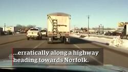 Heroic cop saves disabled truck driver News Clip