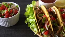tacos with meat and vegetables - Mexican food Stock Footage
