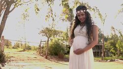 Cute pregnant on natural background. Stock Footage