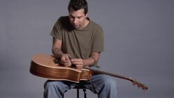 How to Restring a Steel String Acoustic Guitar Instructional Video