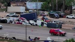 Floodwaters leave cars in piles in Spain's Valencia region Instructional Video