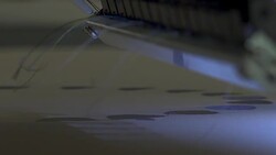 Automatic modern sewing machine embroider a pattern,Industrial embroidery equipment. Textile Manufacturers.Industrial textile factory,Textile Factory. Textile Industry. Stock Footage