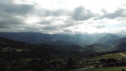 Aerial view of pyrenean mountains with shining sun,  France Stock Footage