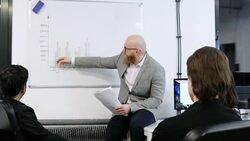 Man presenting data in chart Stock Footage