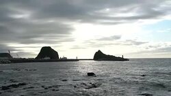 Dramatic Sunset At Utoro's Coastal Area, the Sea-walls And The Sea Of Okhotsk In Hokkaido, Japan Stock Footage
