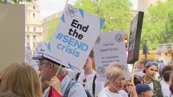 Campaigners at the gates of Downing Street protesting over funding crisis in education for young people with special educational needs and disabilities News Clip