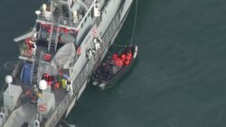 UK: UK Boarder Force vessel intercepting a migrant boat in the English Channel News Clip