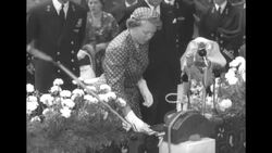 Dutch Princess Beatrix launches destroyer Limburg and laughs as champagne showers spectators News Clip