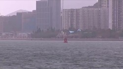 Hong Kong's skyline stock shots in stormy conditions News Clip