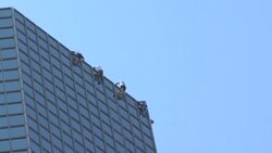 CLEAN : 'Spider man' scales tower in world first in protest at French health pass News Clip