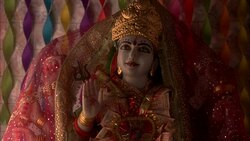 MEDIUM ANGLE OF FACE OF STATUE OF HINDU GOD. RELIGIOUS. Stock Footage