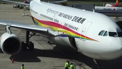 Ground service staff is working on the apron, where a Tibet Airlines airplane will fly from Xi'an to Lhasa. Stock Footage