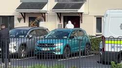 Scene in the Heathfield estate after the bodies of a young girl and a man were found by Gardai in Dublin News Clip
