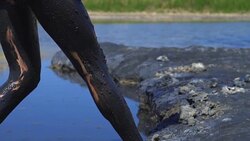 a girl smeared with mud Stock Footage