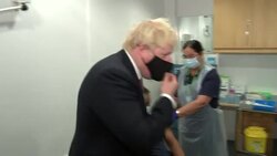 Boris Johnson visiting a Covid vaccination centre News Clip