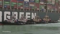 Tug Boats Try to Move Ship Stuck in Suez Canal News Clip