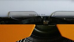 Footage of a person writing TERRORISM HAS NO RELIGION on an old typewriter Stock Footage